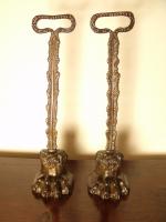 PAIR OF LIONS PAW DOOR STOPS
